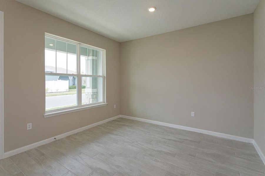 Spacious, unfurnished interior of a new home in Serenade at Ovation, Winter Garden (Image 18).