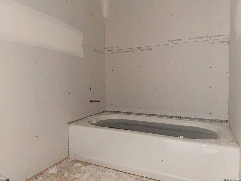 In-progress construction of a new home in Cordova Trails, Seguin, TX (Image 37).