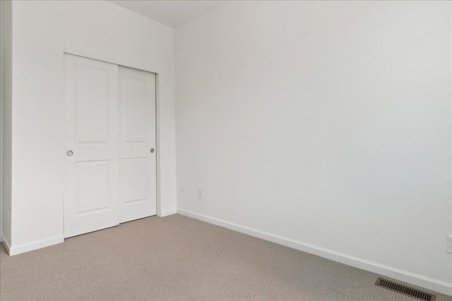 A room with white doors.