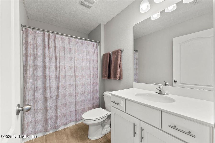 Furnished interior view inside a new home in Cross Creek, Green Cove Springs (Image 11).