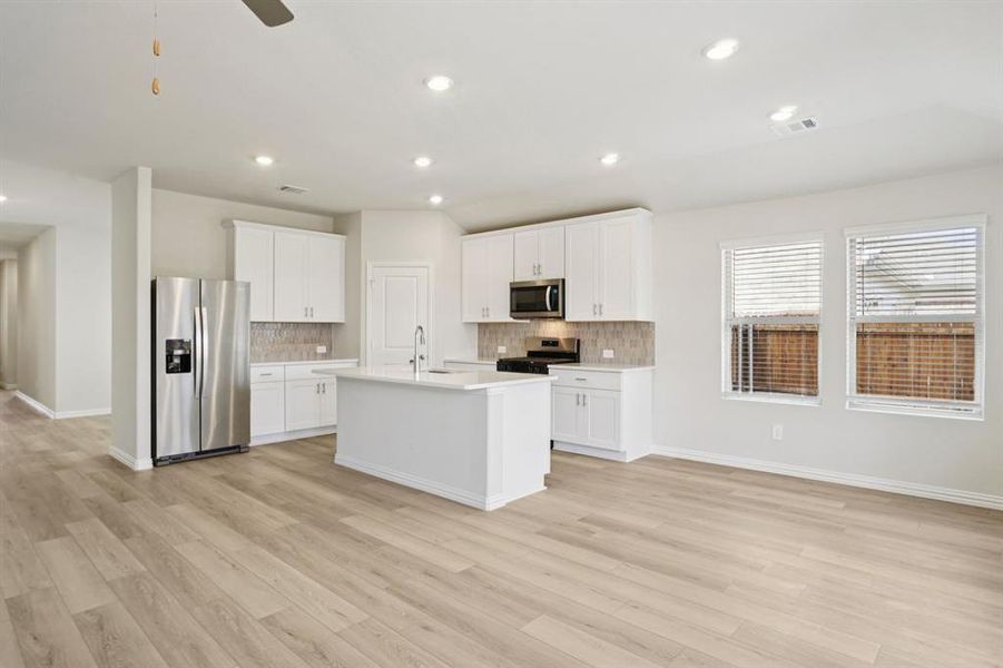 Furnished interior view inside a new home in Parks at Foster Crossing - Premier Series, Anna (Image 6). Furnished interior view inside a new home in Parks at Foster Crossing - Premier Series, Anna (Image 6).