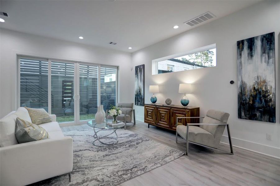 Elegant ground-level living space with abundant natural light and modern finishes.