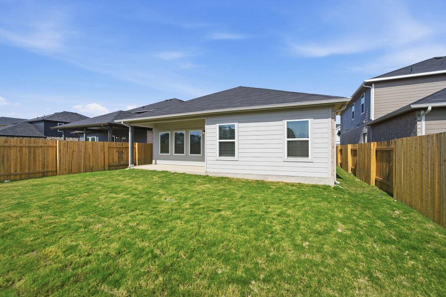 Exterior details and patio area of a home in Sunfield, Buda (Image 3).