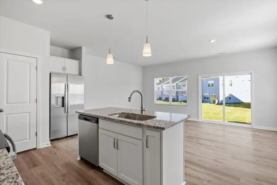 Furnished interior view inside a new home in West Main Townhomes, Sanford (Image 8).