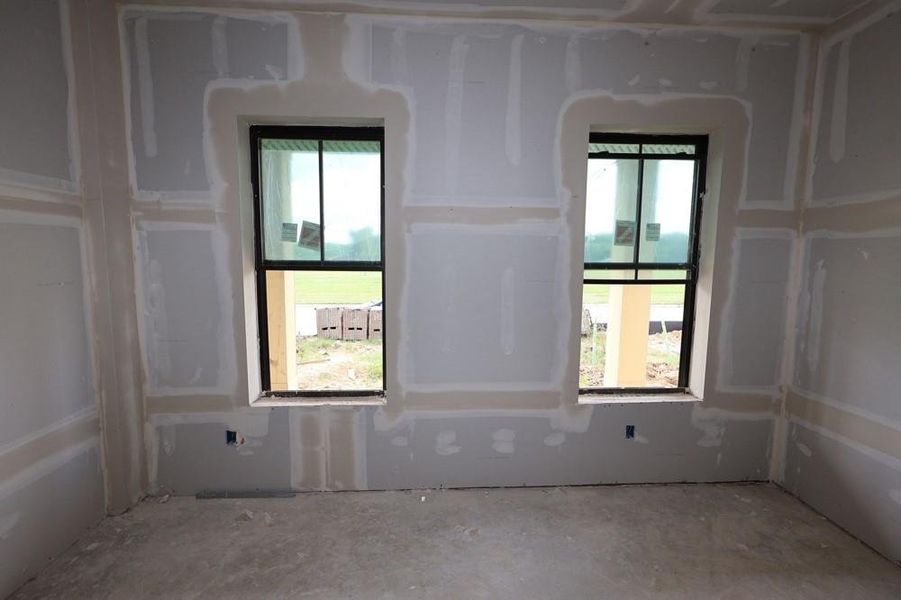 In-progress construction of a new home in Riceland 50’ Alley Load Homesites, Mont Belvieu, TX (Image 6).