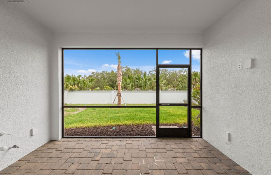 Exterior details and patio area of a home in Shores at Stillwater, Englewood (Image 4).