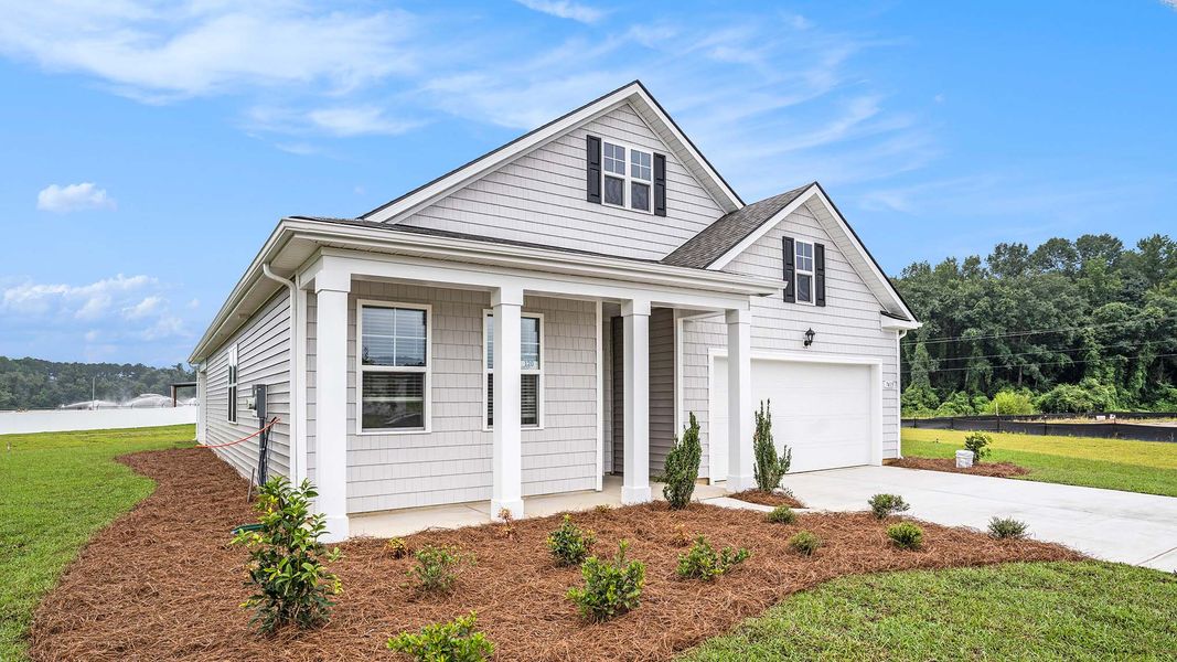 Front exterior of a new home in The Bluffs at Mill Creek, Florence, SC, highlighting curb appeal (Image 11).