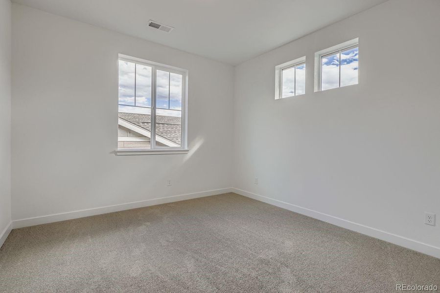 Spacious, unfurnished interior of a new home in Macanta: The Grand Collection, Castle Rock (Image 21).