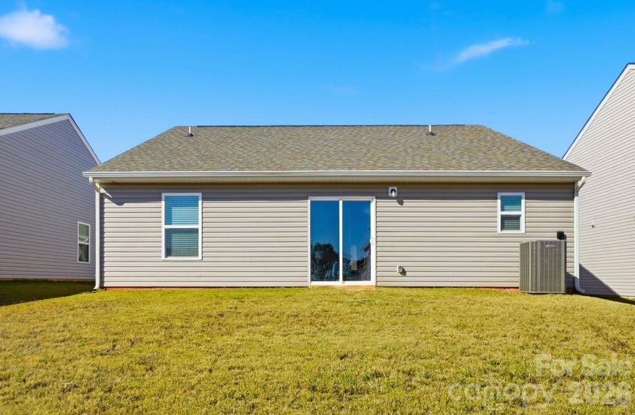 Exterior details and patio area of a home in Knights Bridge, Richburg (Image 3).