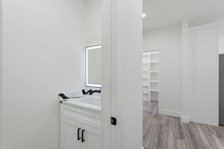Furnished interior view inside a new home in , Conroe (Image 6).