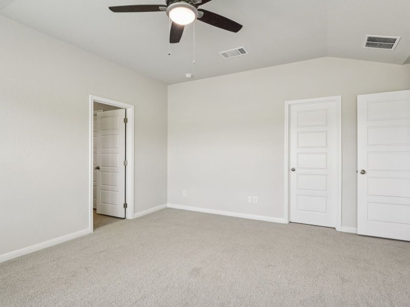 Primary suite in the Oleander floorplan at a Meritage Homes community.