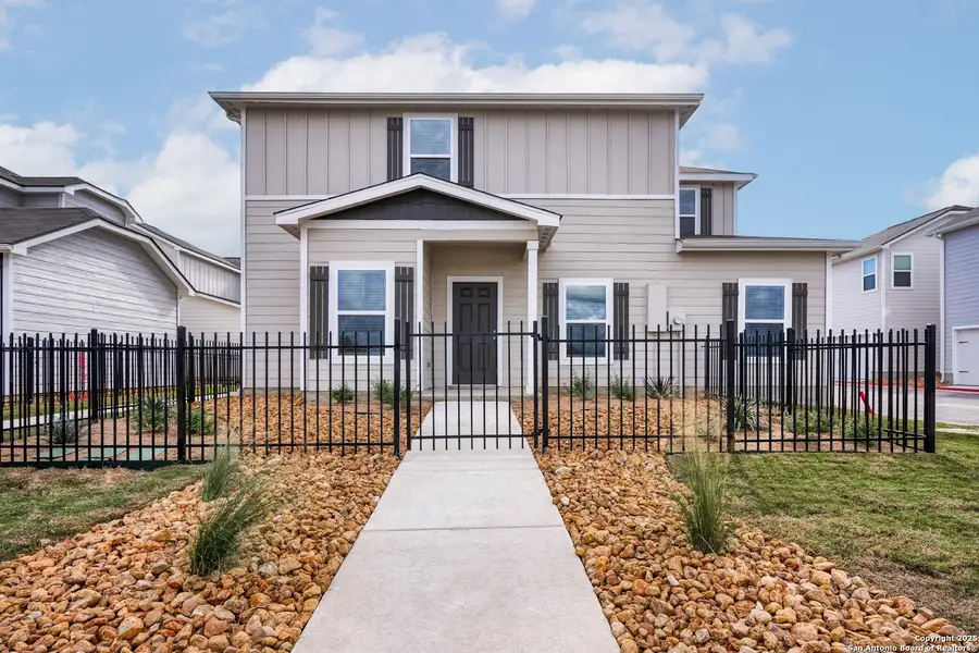 Front exterior of a new home in Luckey Ranch, San Antonio, TX, highlighting curb appeal (Image 1). Front exterior of a new home in Luckey Ranch, San Antonio, TX, highlighting curb appeal (Image 1).