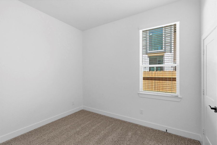 Spacious, unfurnished interior of a new home in Wildrye, Waller (Image 27).