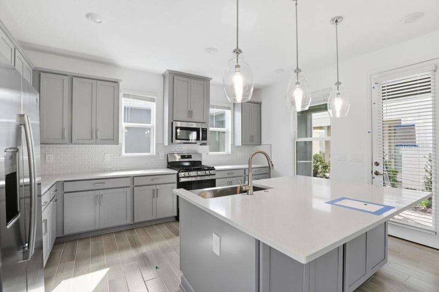 Furnished interior view inside a new home in Harvest at Ovation, Winter Garden (Image 10).