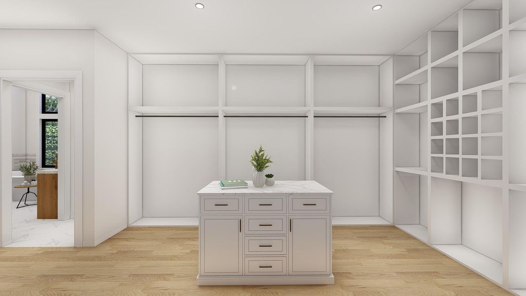 Primary Closet These are Pre-Build Renderings, the home will vary from this photo.