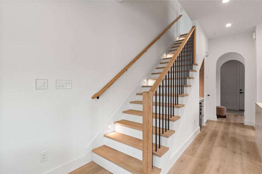 With LED-lit treads guiding the way up, even something as simple as heading to bed feels a little elevated here. It's a small detail, but it adds a sense of quiet luxury to everyday movement through the home.