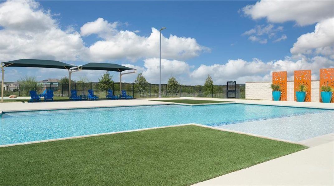 View of swimming pool featuring patio surround