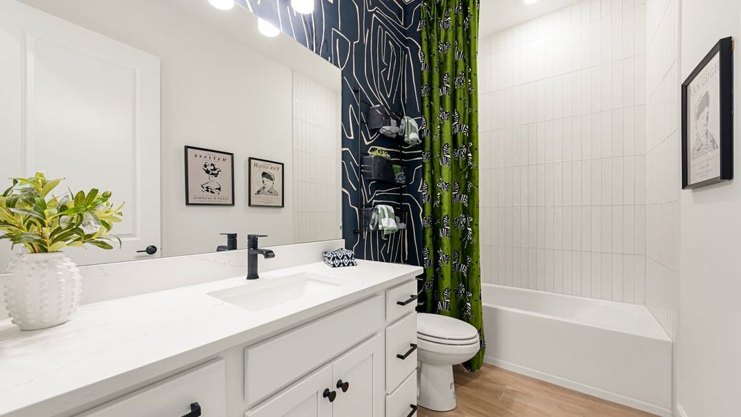 Furnished interior view inside a new home in Esplanade Lake Club, Fort Myers (Image 11).