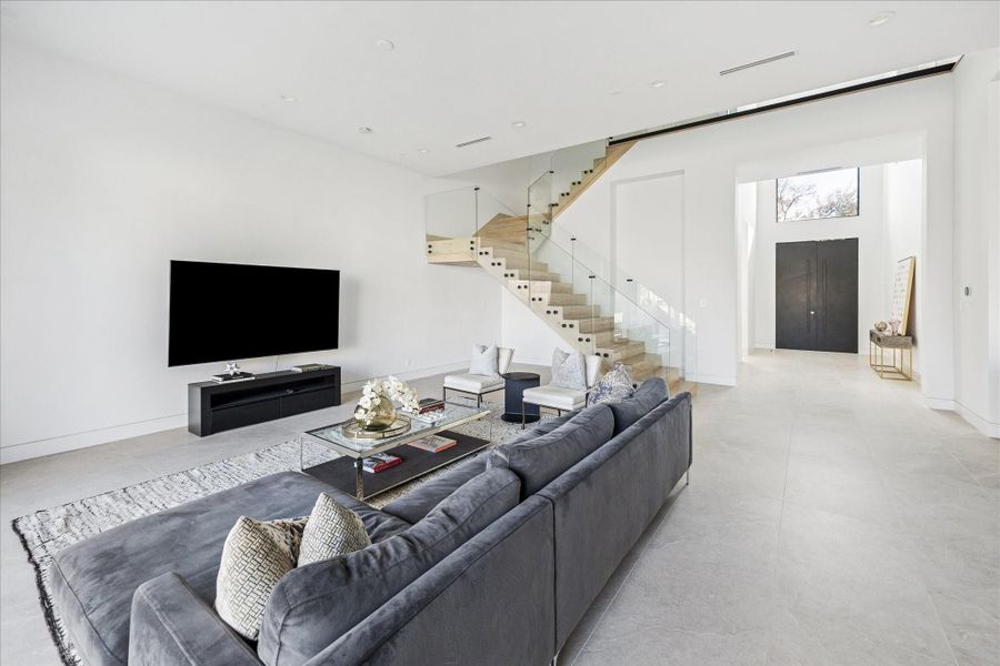 The downstairs spaces seamlessly connect for open, effortless living.