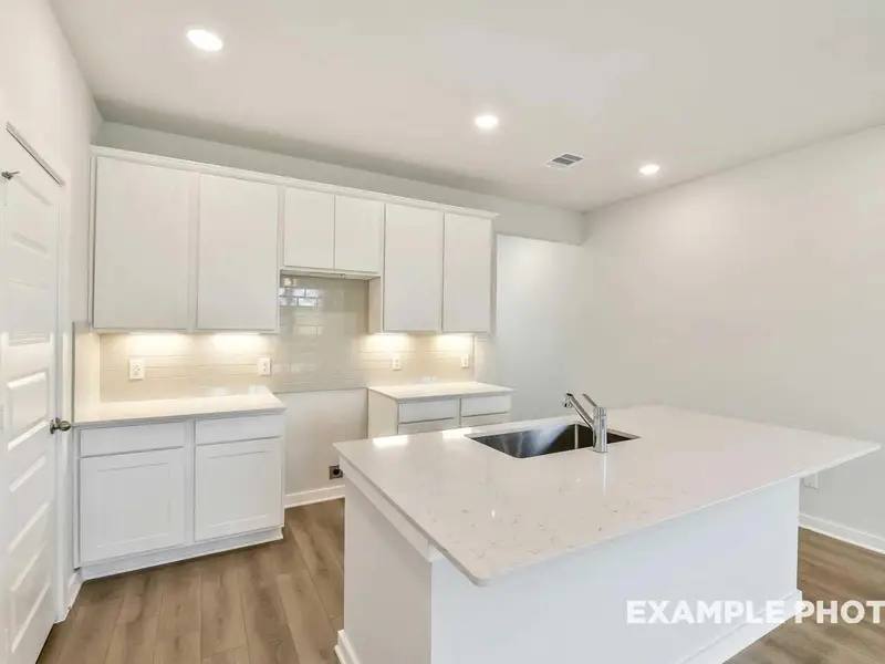 Furnished interior view inside a new home in Caney Creek Place, Conroe (Image 4).
