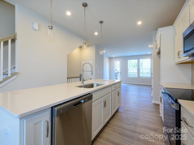 GE Stainless Appliances and Designer Pendant Lighting.