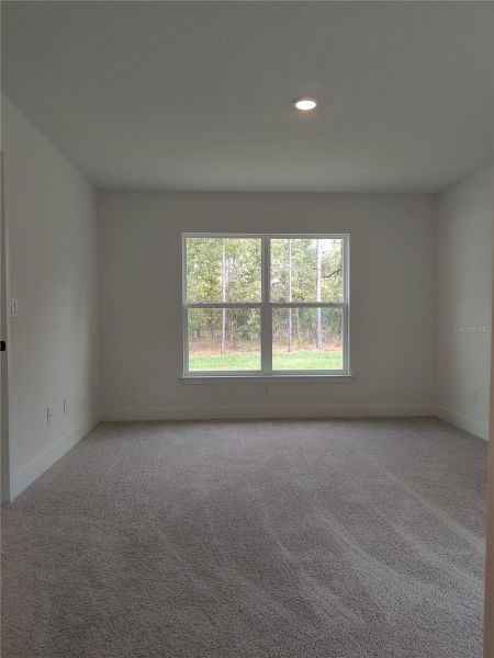 Spacious, unfurnished interior of a new home in Royal Highlands, Weeki Wachee (Image 13).