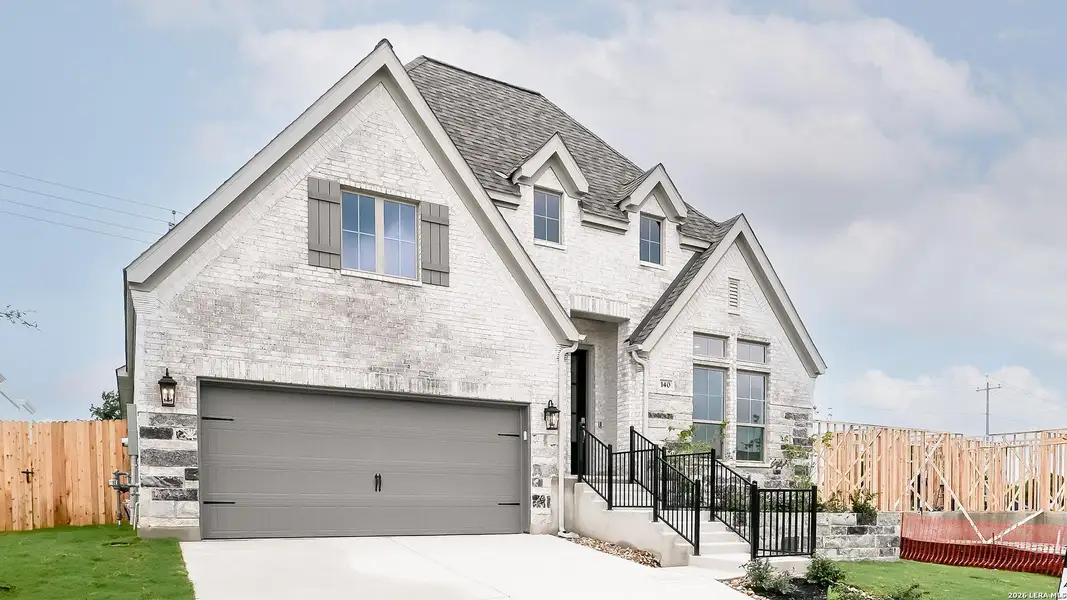 Front exterior of a new home in Cibolo Valley Heights, Cibolo, TX, highlighting curb appeal (Image 2). Front exterior of a new home in Cibolo Valley Heights, Cibolo, TX, highlighting curb appeal (Image 2).