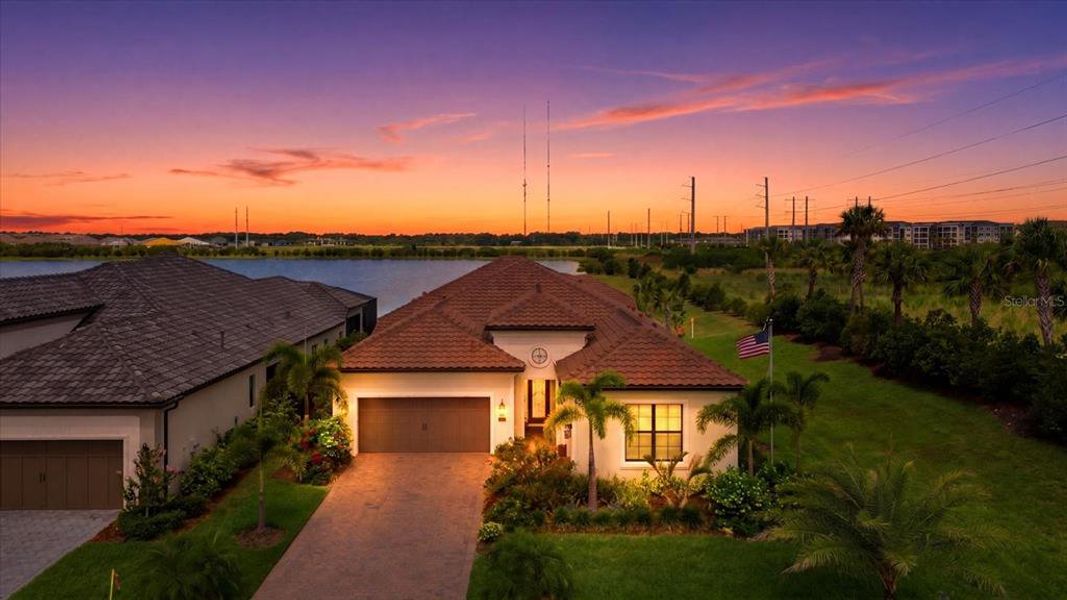 Front exterior of a new home in , Nokomis, FL, highlighting curb appeal (Image 23). Front exterior of a new home in , Nokomis, FL, highlighting curb appeal (Image 23).