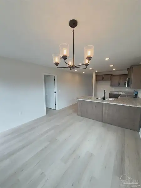 Spacious, unfurnished interior of a new home in Allison Acres, Cantonment (Image 7).