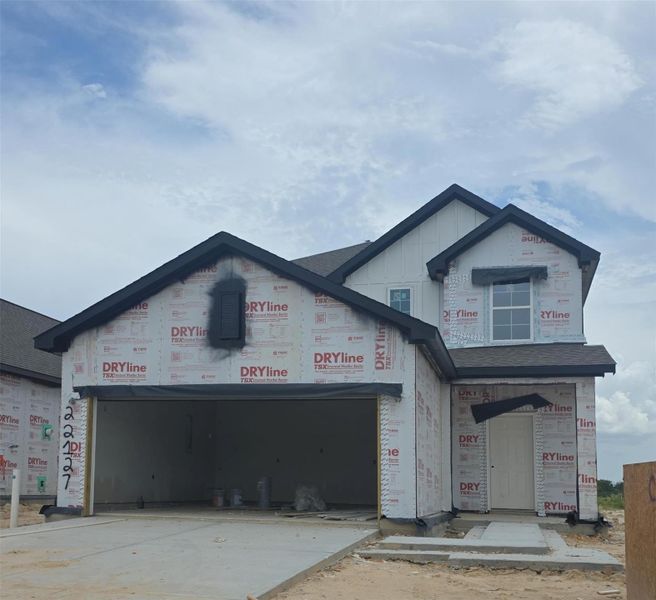 In-progress construction of a new home in Creekland Village at Bridgeland, Cypress, TX (Image 26).