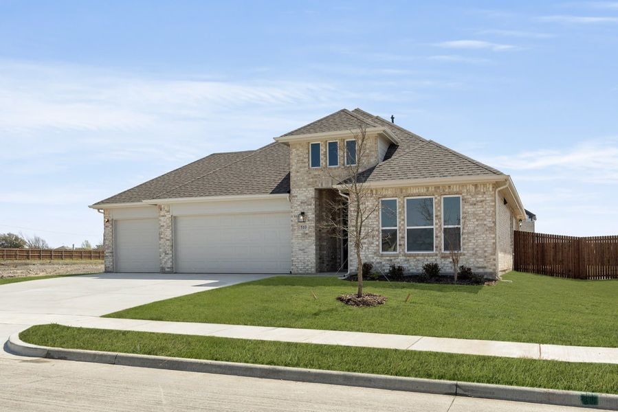 Front exterior of a new home in Park Trails, Forney, TX, highlighting curb appeal (Image 2).