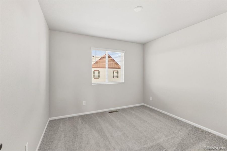 Spacious, unfurnished interior of a new home in Woodrose at Painted Prairie, Aurora (Image 22).