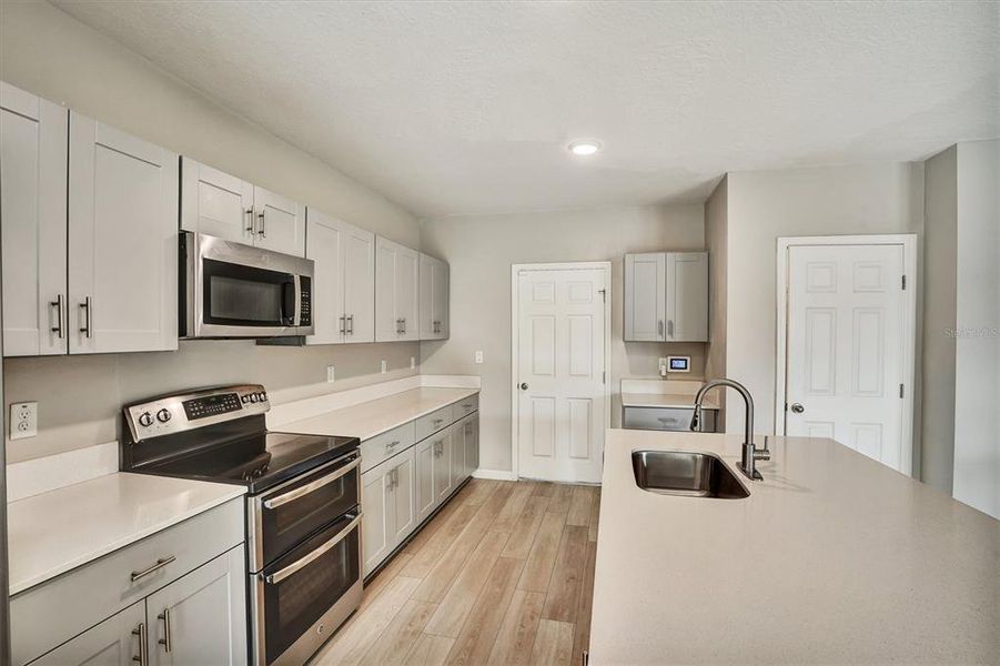 Furnished interior view inside a new home in Hammock Reserve, Haines City (Image 7).