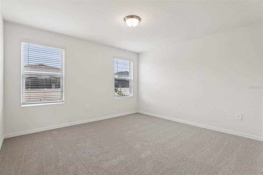 Spacious, unfurnished interior of a new home in Cagan Crossings West, Clermont (Image 31).