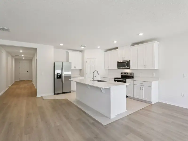 Furnished interior view inside a new home in Springs at Lake Alfred - Signature Series, Lake Alfred (Image 3). Furnished interior view inside a new home in Springs at Lake Alfred - Signature Series, Lake Alfred (Image 3).