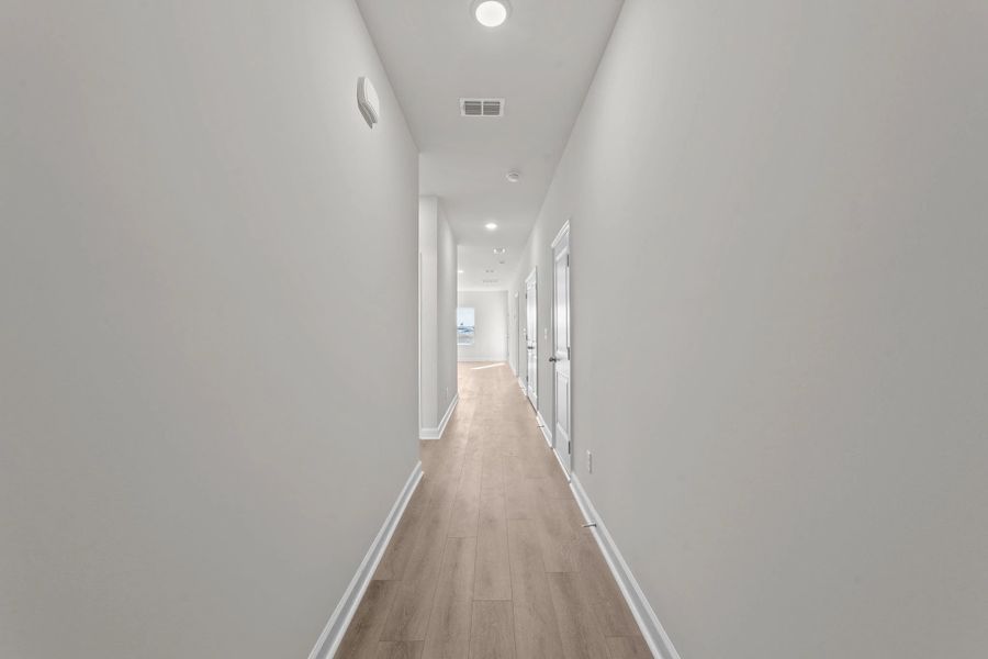 Spacious, unfurnished interior of a new home in Blue Heron Retreat: Villas, Little River (Image 12).