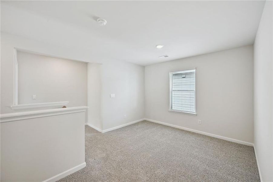 Spacious, unfurnished interior of a new home in Hawthorne Station, College Park (Image 32).