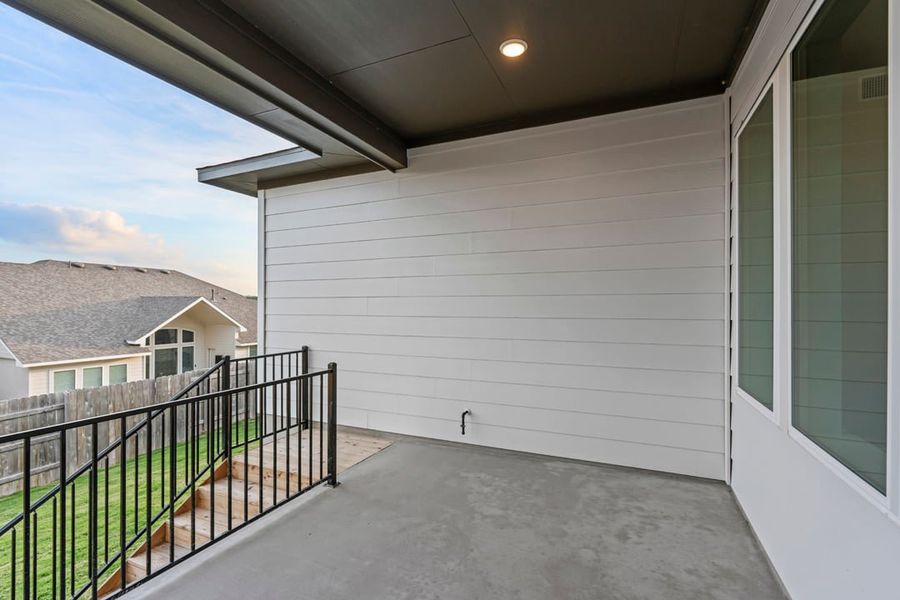 Exterior details and patio area of a home in Park Collection at Lariat, Liberty Hill (Image 26). Exterior details and patio area of a home in Park Collection at Lariat, Liberty Hill (Image 26).