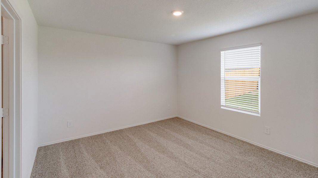 Representative unfurnished interior of a home built from the The Caprock by D.R. Horton in Watermill, Uhland (Image 12).