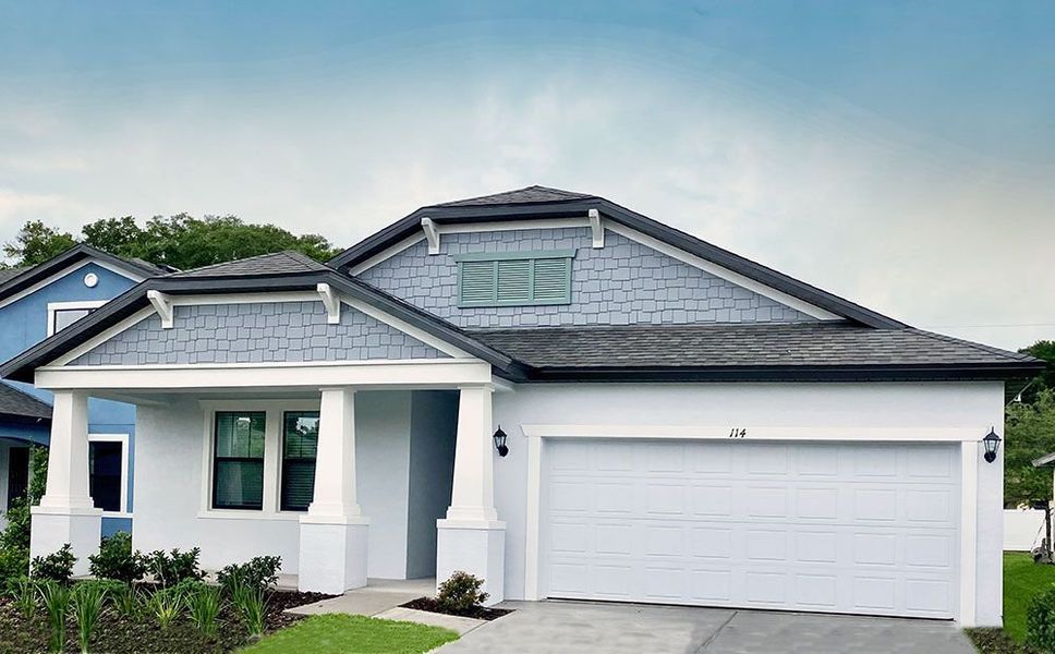 Front exterior of a new home in Pinecone Reserve, Brooksville, FL, highlighting curb appeal (Image 15). Front exterior of a new home in Pinecone Reserve, Brooksville, FL, highlighting curb appeal (Image 15).
