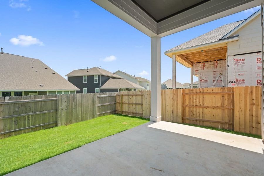 Exterior details and patio area of a home in Lariat, Liberty Hill (Image 28).