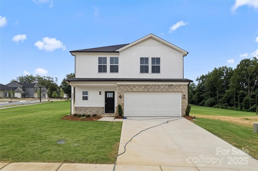 Front exterior of a new home in , Kannapolis, NC, highlighting curb appeal (Image 2). Front exterior of a new home in , Kannapolis, NC, highlighting curb appeal (Image 2).