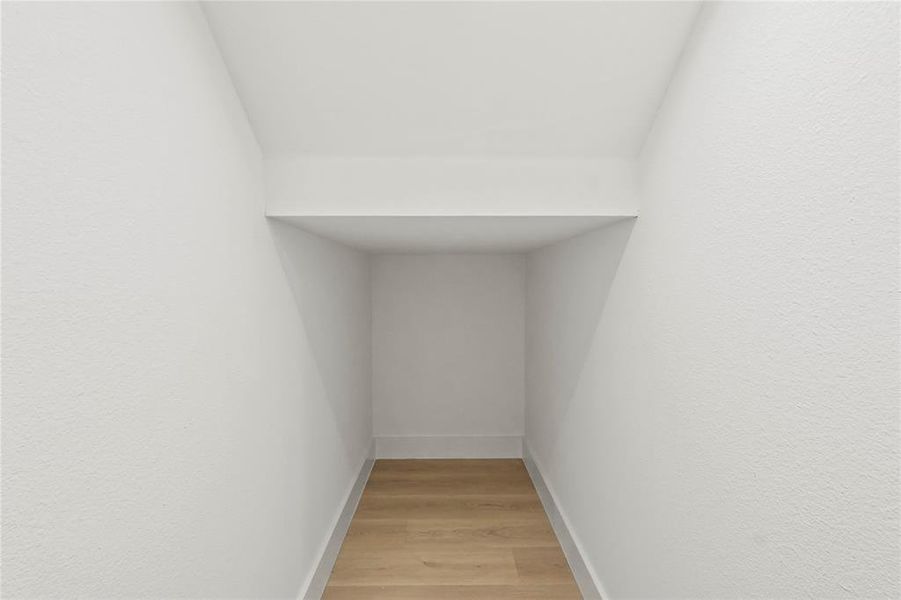 Detailed view of wood finished floors and baseboards Detailed view of wood finished floors and baseboards