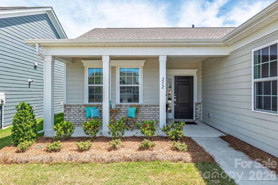 Exterior details and patio area of a home in Esplanade at Northgate, Indian Trail (Image 30).