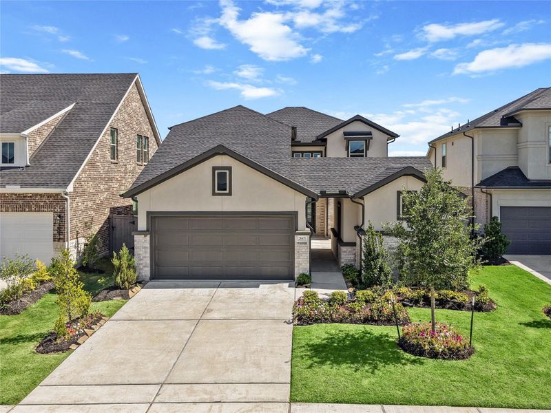 Front exterior of a new home in Jubilee 45', 70', Hockley, TX, highlighting curb appeal (Image 2).