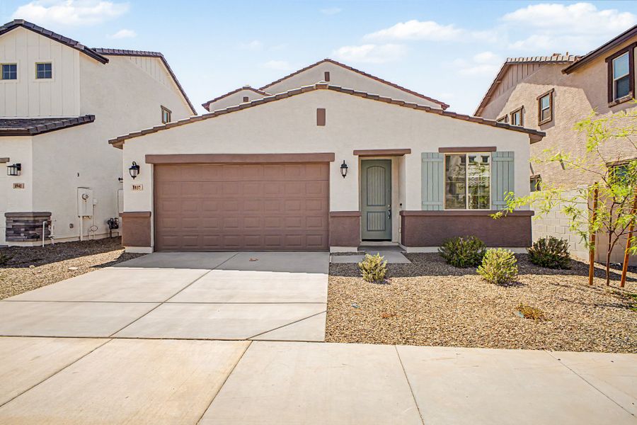 Front exterior of a new home in Rialta, Mesa, AZ, highlighting curb appeal (Image 1). Front exterior of a new home in Rialta, Mesa, AZ, highlighting curb appeal (Image 1).