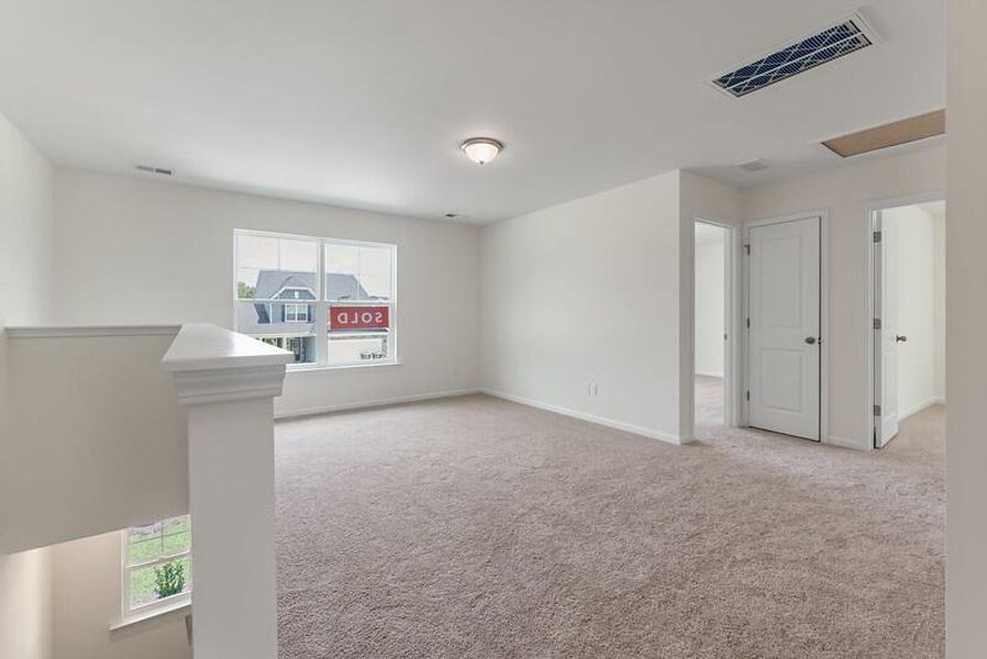Spacious, unfurnished interior of a new home in Parker's Preserve, Ridgeville (Image 8).