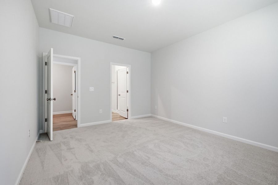 Spacious, unfurnished interior of a new home in Carpenter Falls, Durham (Image 25).