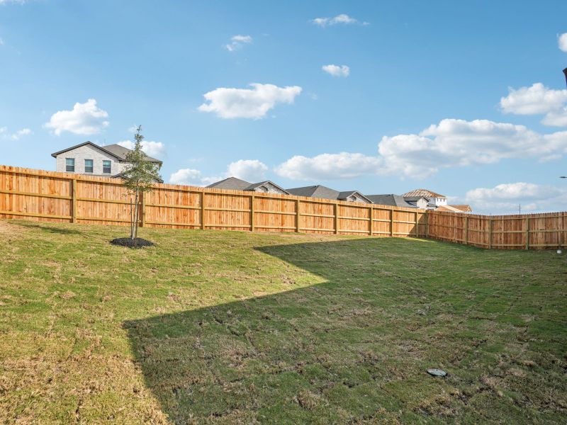 Exterior details and patio area of a home in Lark Canyon, New Braunfels (Image 19).