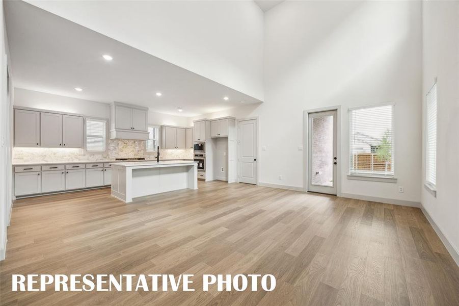 You'll love hosting the entire family for holiday get togethers in this spacious family room.  REPRESENTATIVE PHOTO